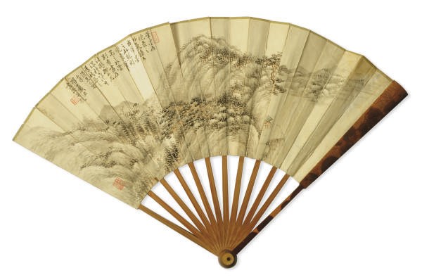 A CHINESE FAN PAINTING OF A MOUNTAIN LANDSCAPE WITH A CARVED BAMBOO HANDLE,