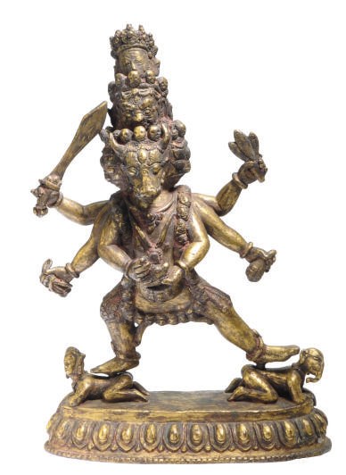 A TIBETAN GILT-BRONZE FIGURE OF VAJRA BHAIRAVA AND BASE,