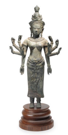 A KHMER BRONZE FIGURE OF PRAJNAPARAMITA, TEN-HANDED FEMALE,