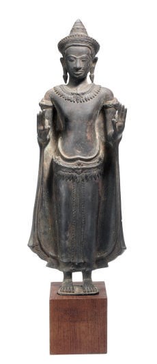 A KHMER BRONZE FIGURE OF A STANDING MALE DEITY,