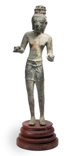A CAMBODIAN PRA-KON STYLE BRONZE FIGURE