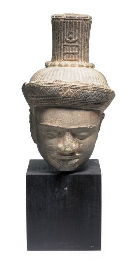 A KHMER STONE HEAD OF A BUDDHA,