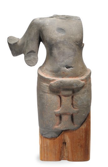 A KHMER SANDSTONE FRAGMENT OF A MALE TORSO,
