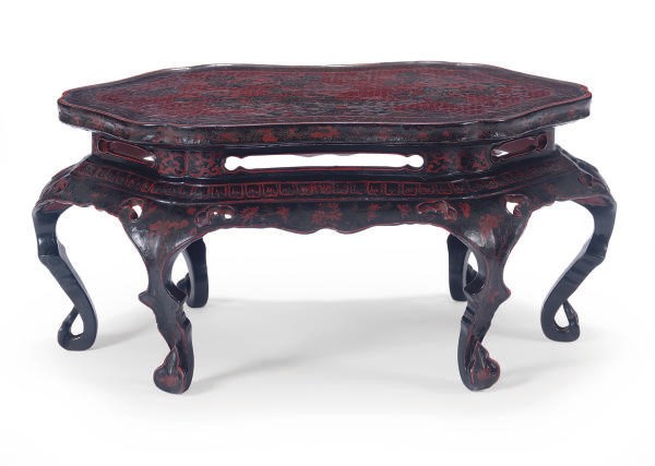 A CHINESE BROWN AND RED LACQUER SMALL STAND,