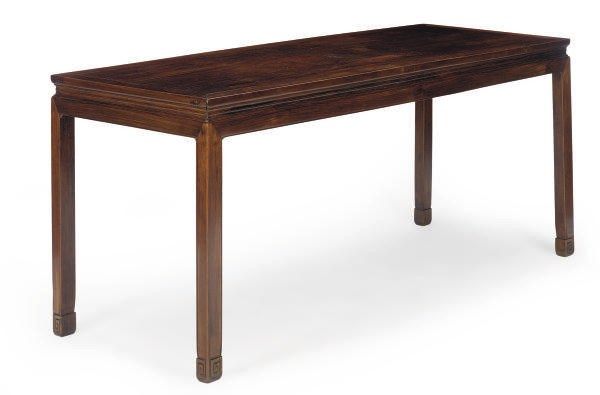 A CHINESE HARDWOOD LARGE WAISTED CORNER LEG TABLE
