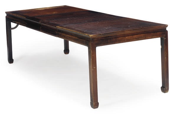 A CHINESE HARDWOOD EXTENDING DINING TABLE,