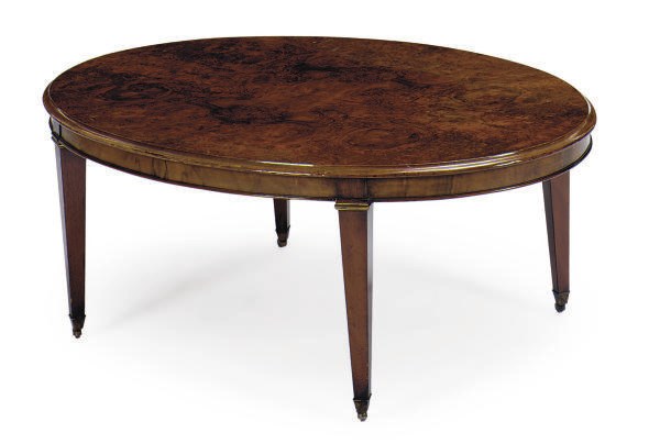 A WALNUT AND PARCEL-GILT OVAL COFFEE TABLE,