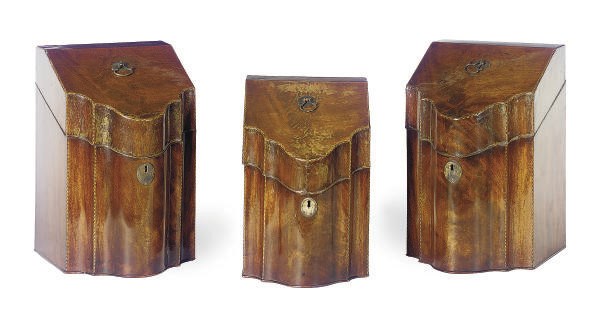 A SET OF THREE GEORGE III MAHOGANY AND CHEVRON-BANDED SERPENTINE CUTLERY-BOXES,