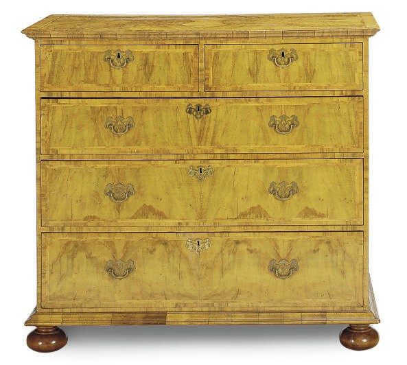 AN ENGLISH WALNUT AND FEATHERBANDED CHEST-OF-DRAWERS,