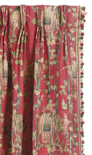 A SET OF SIX RED GROUND PRINT CURTAINS,