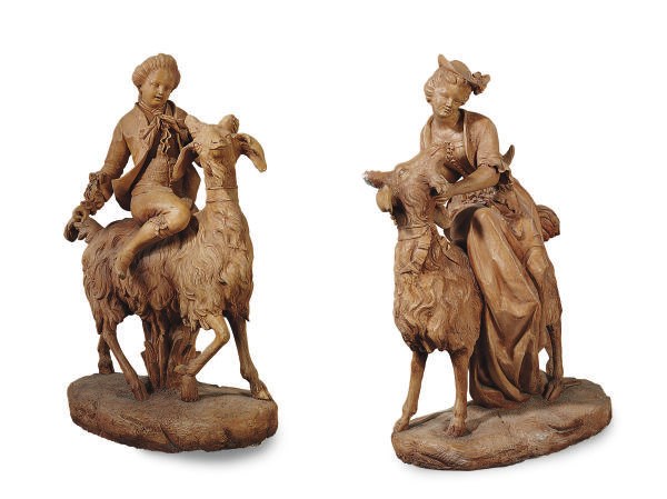 A PAIR OF TERRACOTTA FIGURE GROUPS