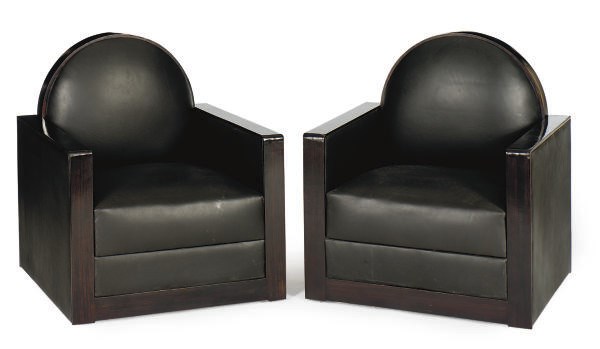 A PAIR OF EBONIZED AND LEATHER-UPHOLSTERED CLUB CHAIRS,