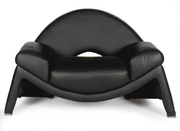 A PAIR OF CHROMED-METAL MOUNTED BLACK-VINYL ARMCHAIRS,