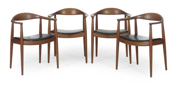 A MATCHED SET OF SEVEN TEAK DINING CHAIRS,