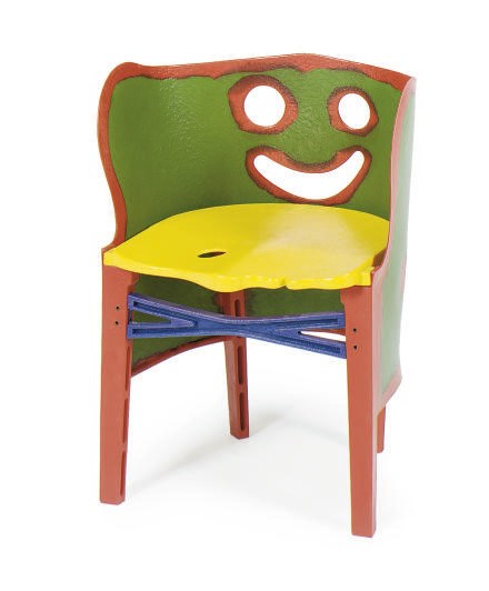 A RESIN CHILD'S CHAIR,