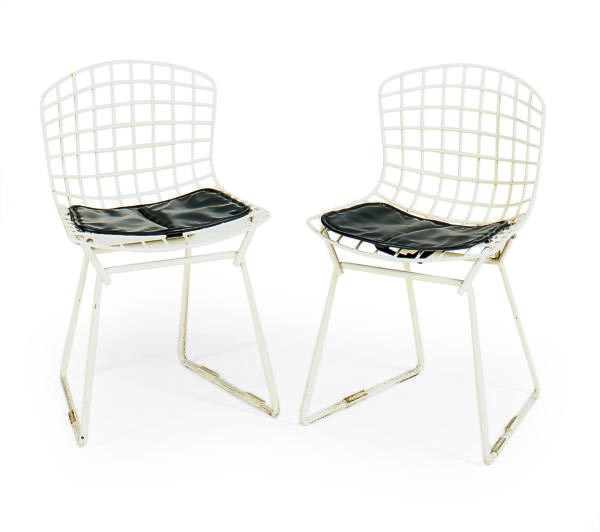 A SET OF SEVEN WIRE CHILD'S CHAIRS,