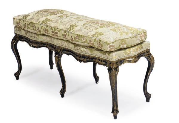 AN ITALIAN BLACK AND GILT-DECORATED WINDOW BENCH,