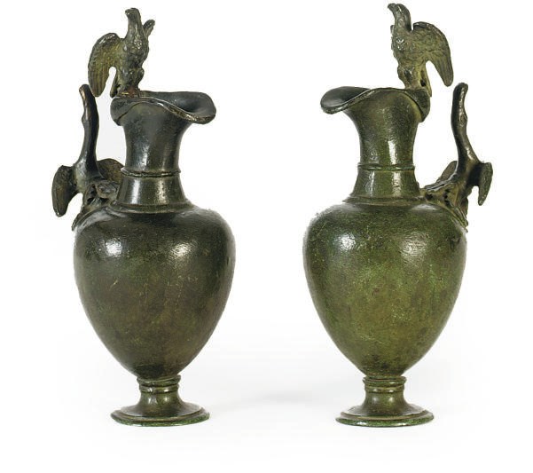A PAIR OF VERDIGRIS PATINATED BRASS EWERS,