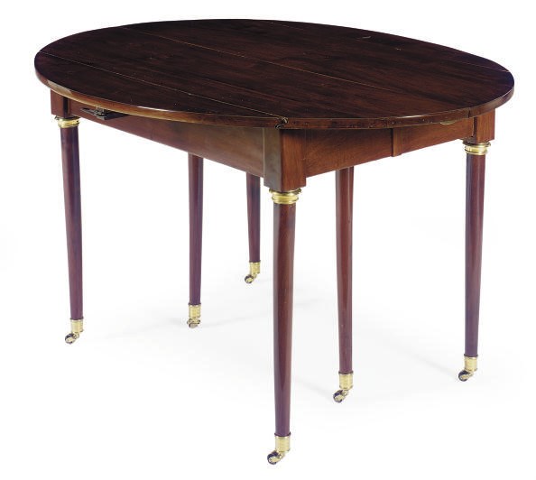 A FRENCH MAHOGANY EXTENDING DROP-LEAF DINING TABLE,