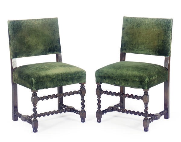 A SET OF FOUR STAINED WOOD AND GREEN-VELVET UPHOLSTERED SIDE CHAIRS,