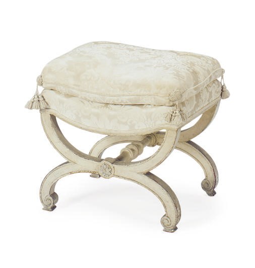 A WHITE-PAINTED AND UPHOLSTERED CURULE-FORM STOOL,