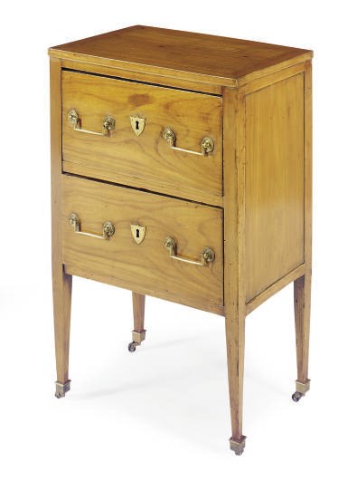 A CONTINENTAL FRUITWOOD COMMODE,