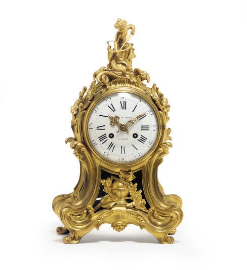 A FRENCH GILT-BRONZE MANTELCLOCK,