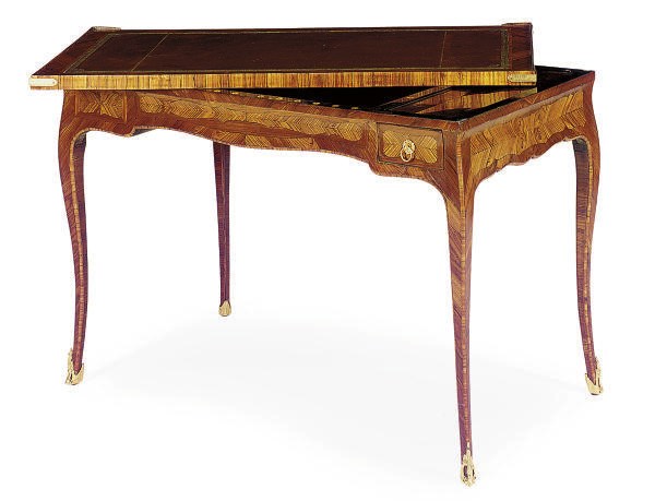 A LOUIS XV GILT-BRONZE MOUNTED TULIPWOOD TRIC-TRAC TABLE**,