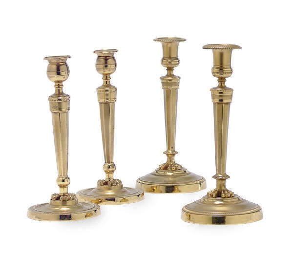 TWO PAIRS OF FRENCH GILT-BRONZE CANDLESTICKS,