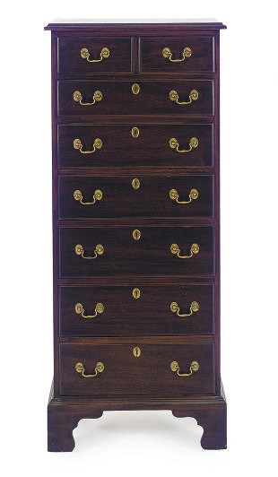 A MAHOGANY TALL CHEST-OF-DRAWERS,