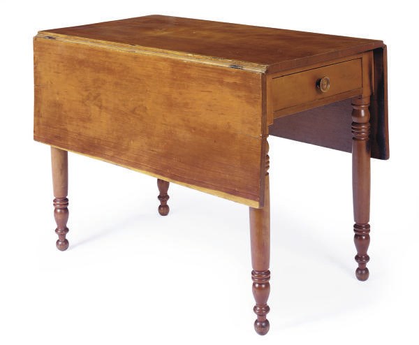 AN AMERICAN CHERRYWOOD DROP-LEAF TABLE,