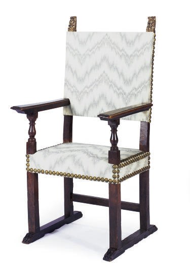 A CONTINENTAL MAHOGANY AND PARCEL-GILT ARMCHAIR,