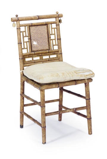 A FAUX BAMBOO AND CANED SIDE CHAIR,