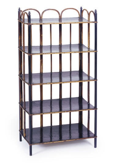 AN EBONIZED AND RATTAN ETAGERE,