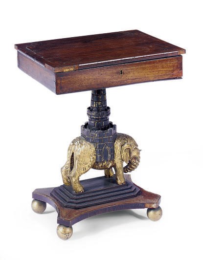 AN ENGLISH ROSEWOOD, EBONIZED AND PARCEL-GILT WORK TABLE**,