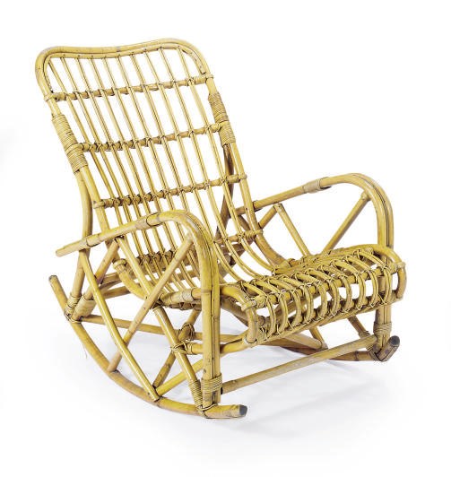 A RATTAN ROCKING CHAIR,