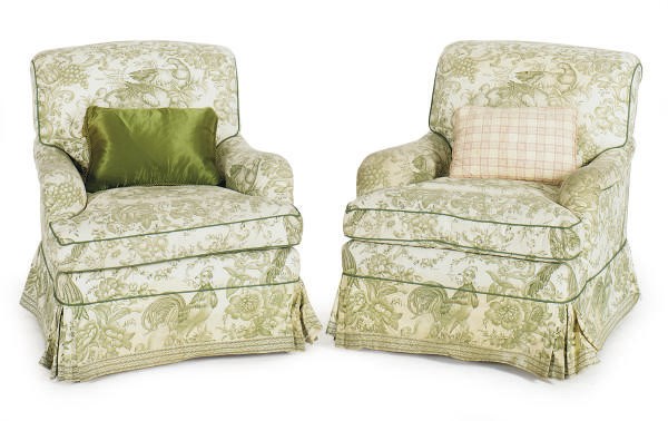 A PAIR OF UPHOLSTERED LOUNGE CHAIRS,