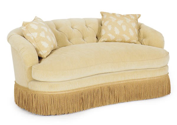 AN UPHOLSTERED SETTEE,