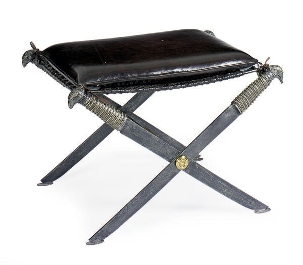 A PATINATED AND GILT-METAL X-FORM STOOL,