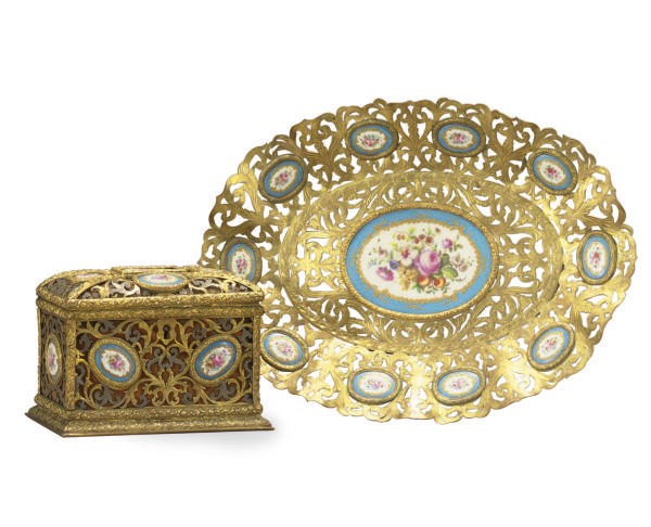 A GILT-BRONZE AND PORCELAIN-INSET OVAL TRAY AND CASKET,