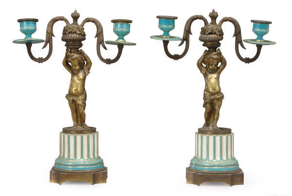 A PAIR OF GILT-BRONZE AND PORCELAIN FIGURAL CANDELABRA,