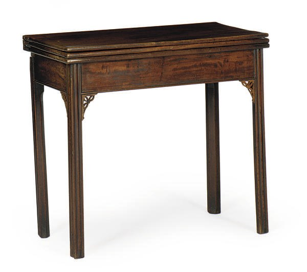 A GEORGE III MAHOGANY TRIPLE FOLD-OVER GAMES TABLE,