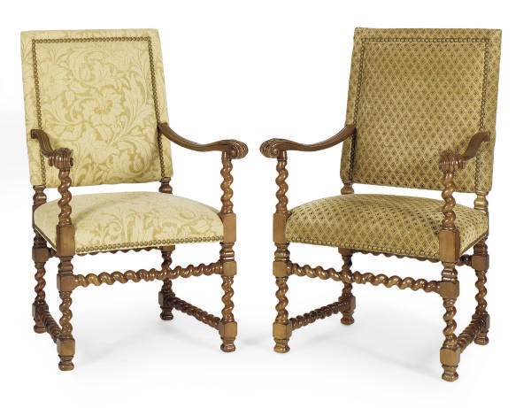 A SET OF FOUR BEECHWOOD ARMCHAIRS,