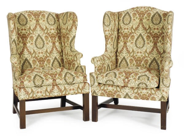 A PAIR OF MAHOGANY AND UPHOLSTERED WINGBACK ARMCHAIRS,