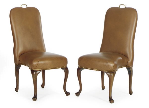 A SET OF SIXTEEN MAHOGANY AND LEATHER UPHOLSTERED DINING CHAIRS,