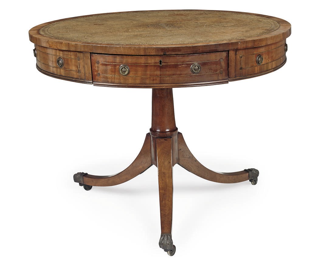 A GEORGE IV MAHOGANY INLAID LIBRARY DRUM TABLE