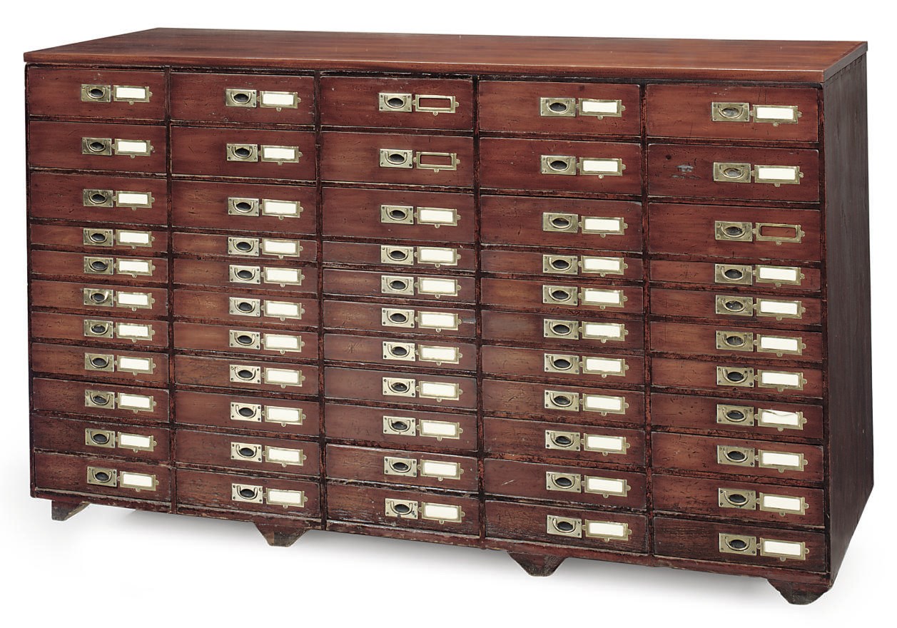 A MAHOGANY FILING CABINET