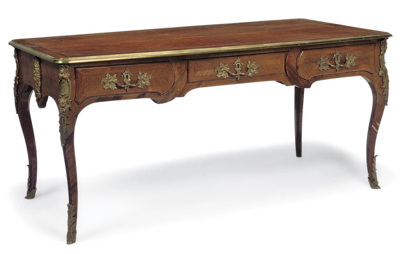 A FRENCH GILT-BRONZE MOUNTED KINGWOOD BUREAU PLAT