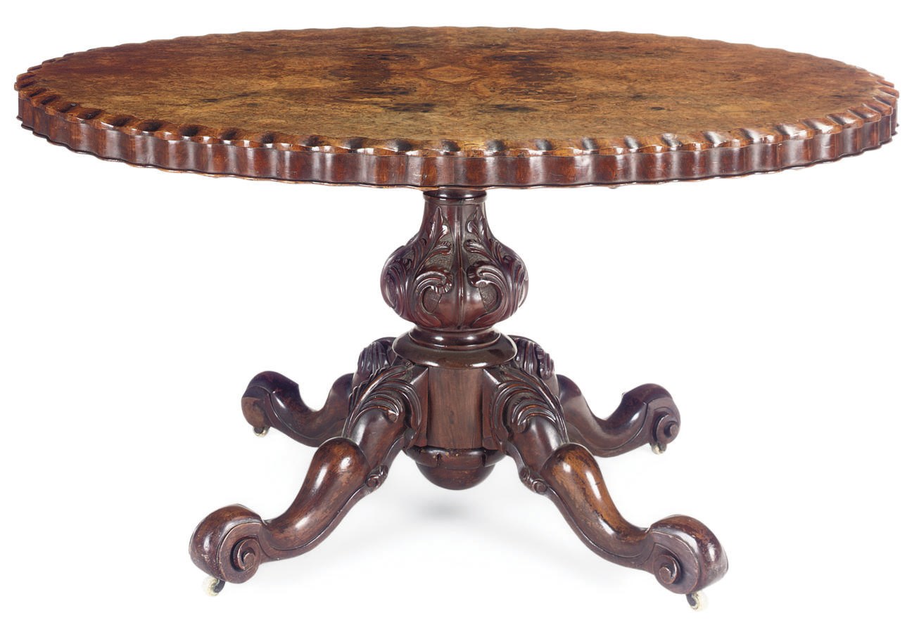 A VICTORIAN BURR WALNUT QUARTER VENEERED BREAKFAST TABLE