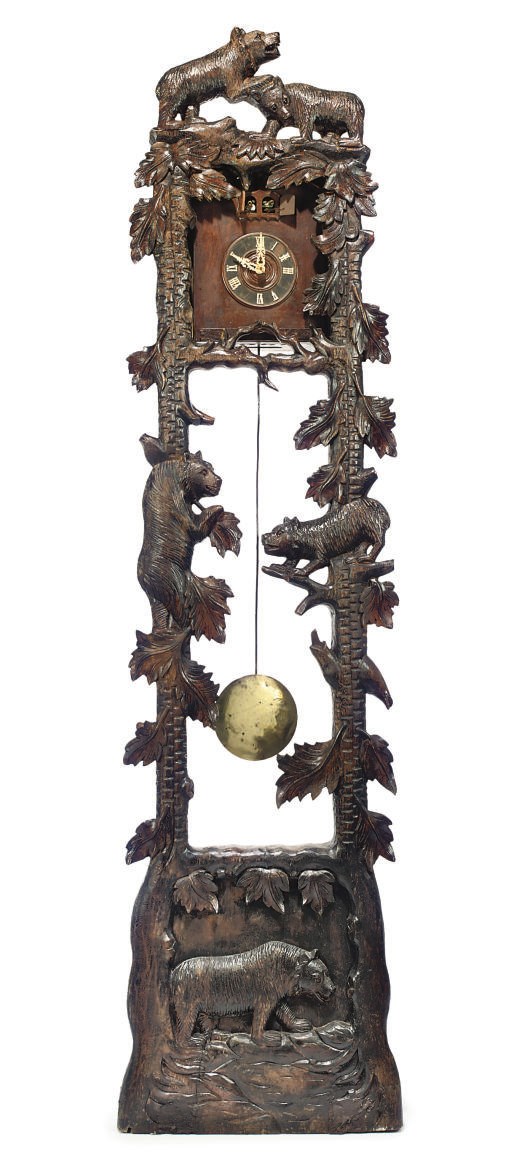 A SWISS 'BLACK FOREST' CARVED WOOD NOVELTY LONGCASE CUCKCOO CLOCK